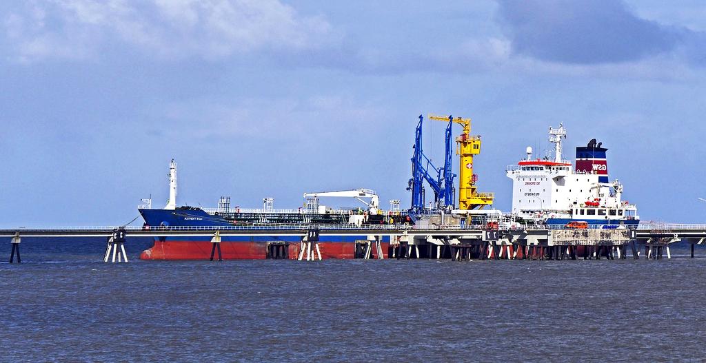 Crude oil refinery with storage tanks and processing units