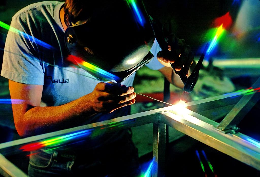 Natural gas processing facility with flame